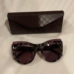 Gucci sunglasses. Impulse duty free purchase and they need a new home!